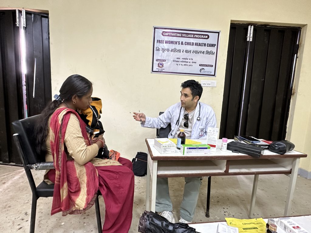 Mother with baby during doctor's consultatiion