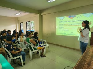 Staff giving a talk to beneficiaries