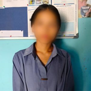 Woman with faced blurred for privacy