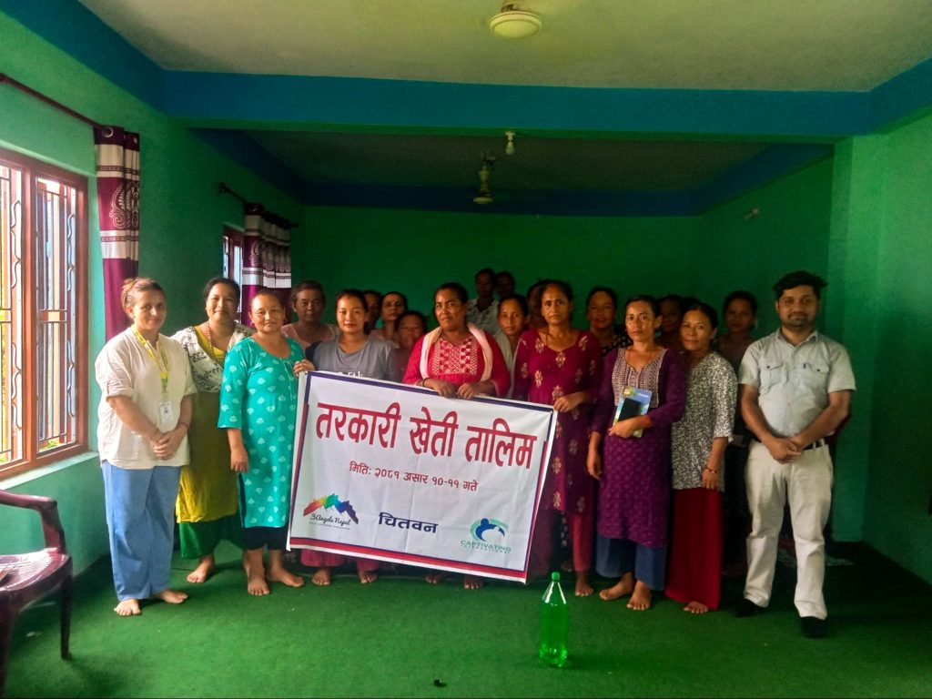 Group of Nepali women who attended a training posing for a photo