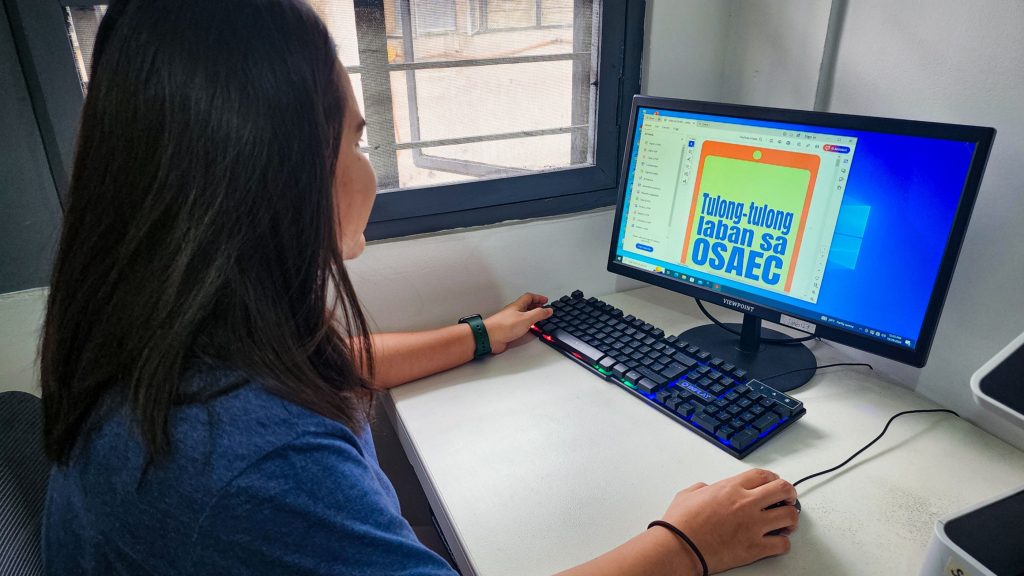 Woman using a desktop computer