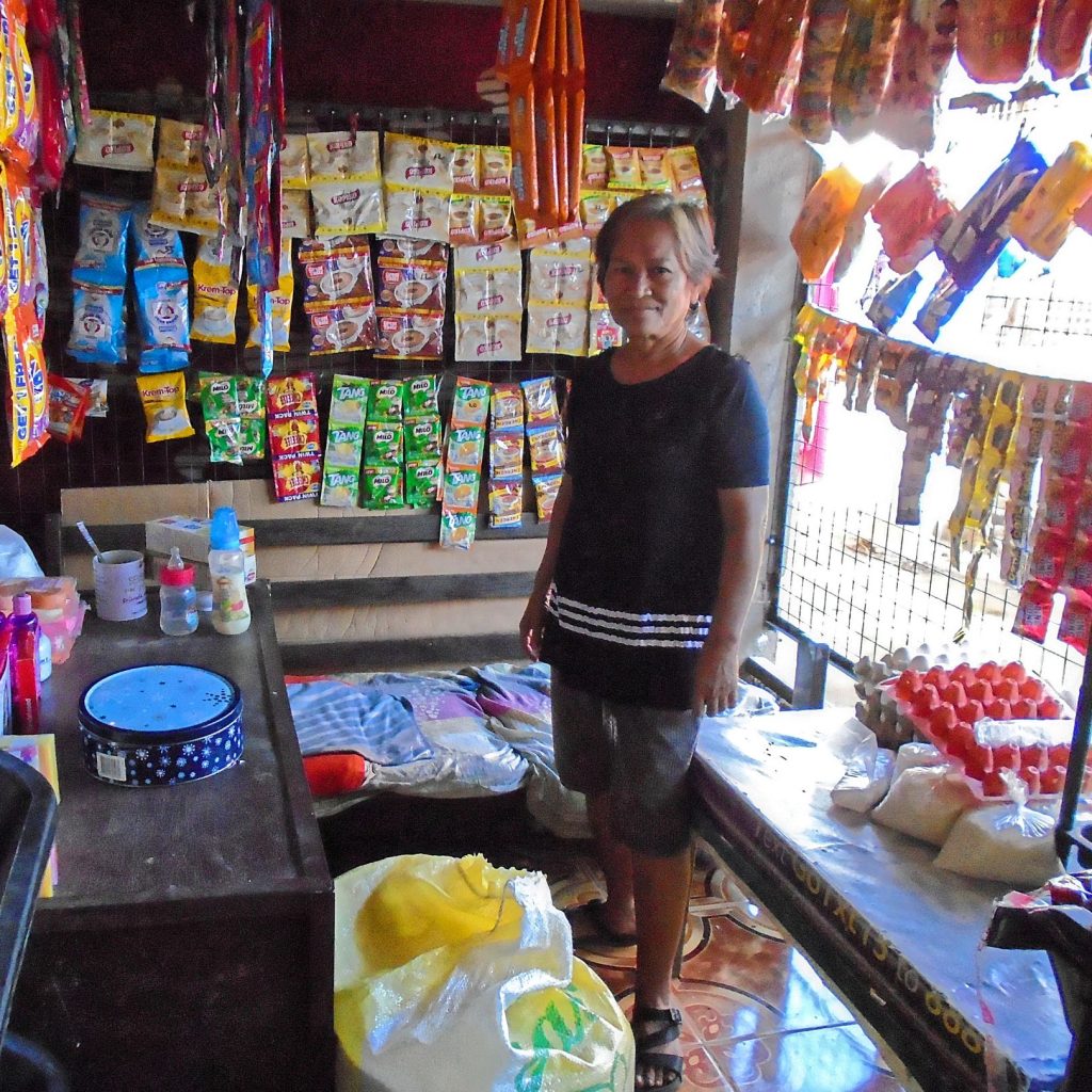 Filipino woman in her variety store