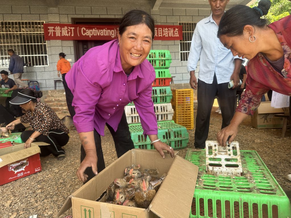 woman with chickens