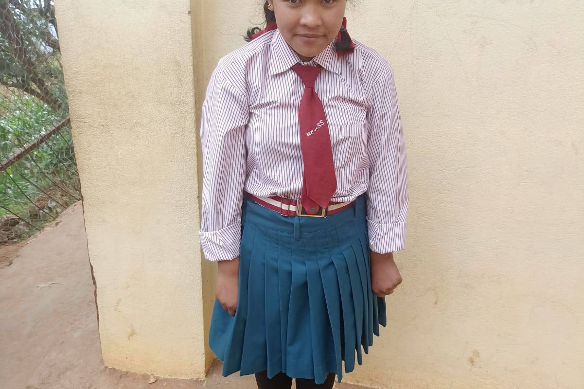 Nepali girl in school uniform