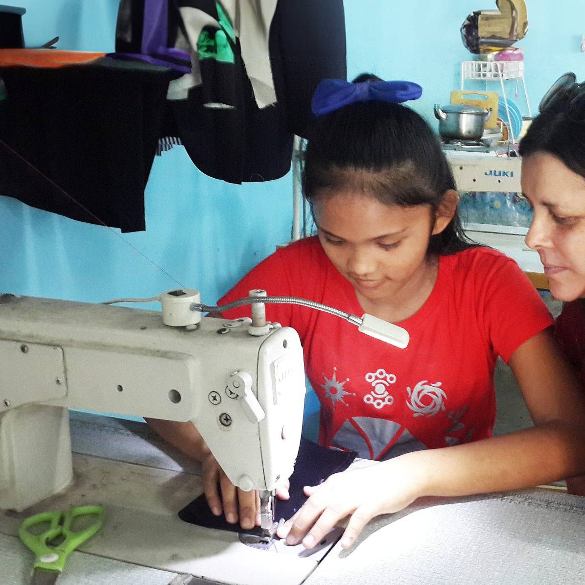 a child sewing