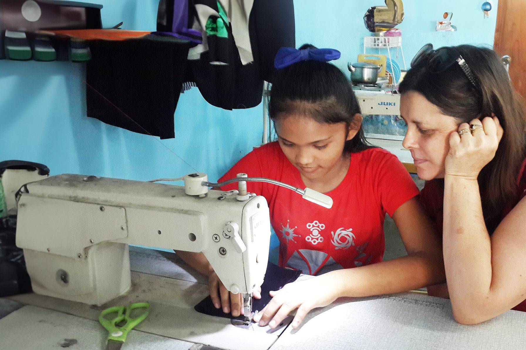 a child sewing