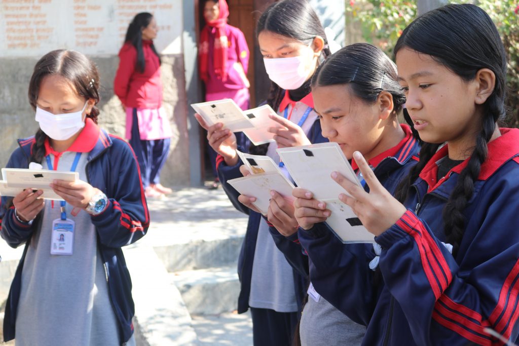 Students Reading a Material