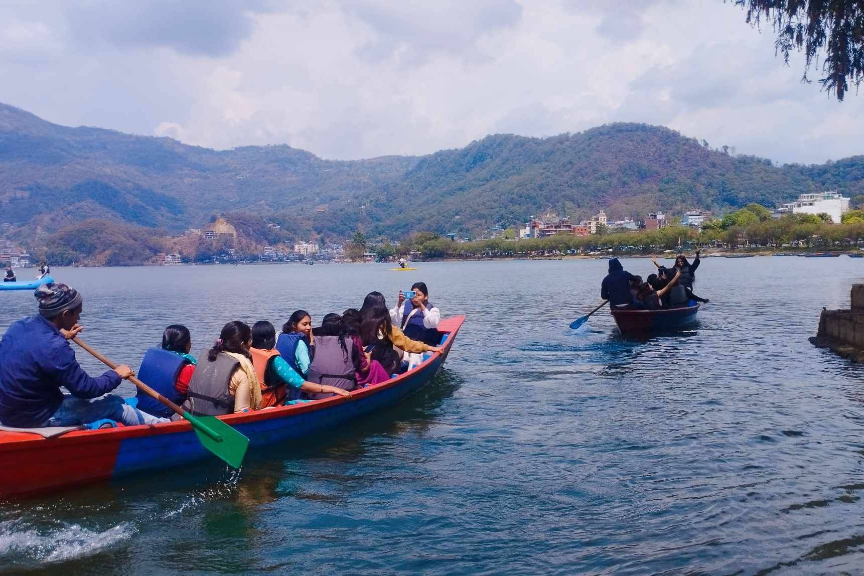 people on boats