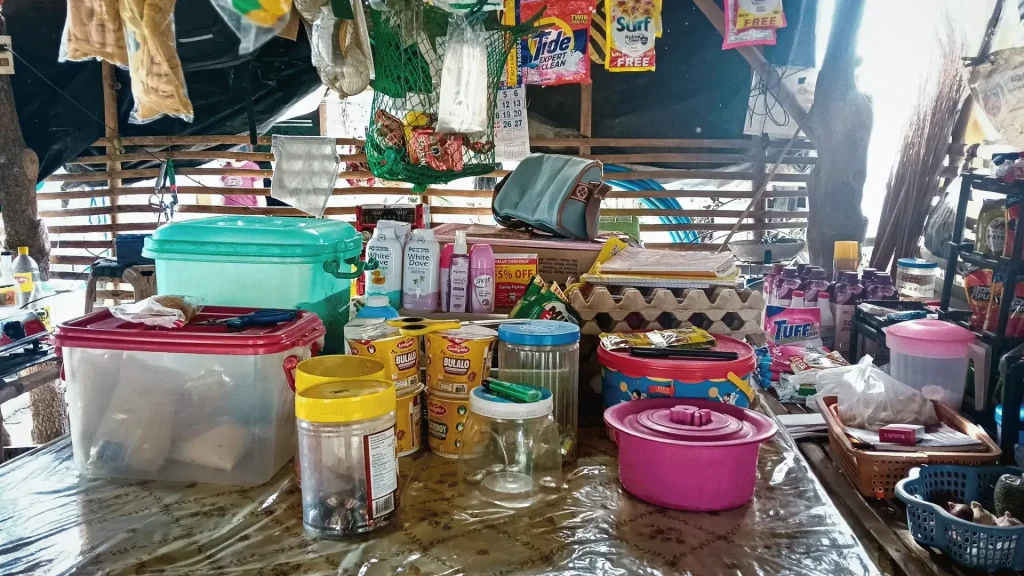 A table covered with numerous items, highlighting a diverse collection of objects.