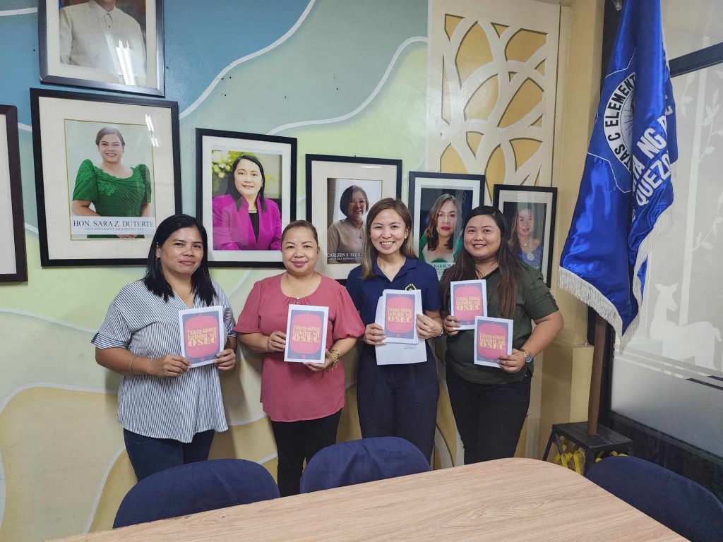 Teachers Holding Anti-OSAEC materials