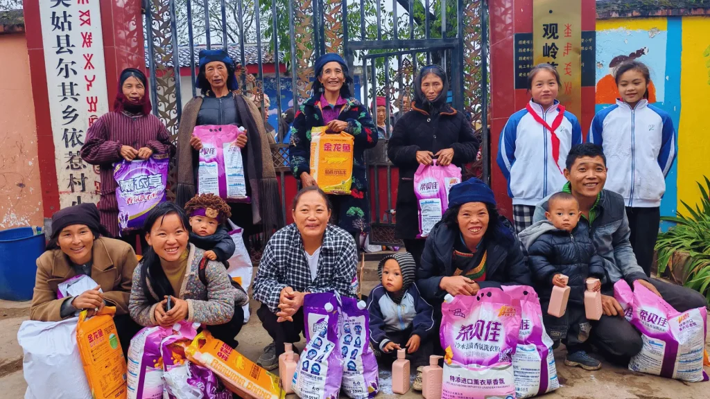 Several individuals joyfully holding bags of food, showcasing community support and sharing.