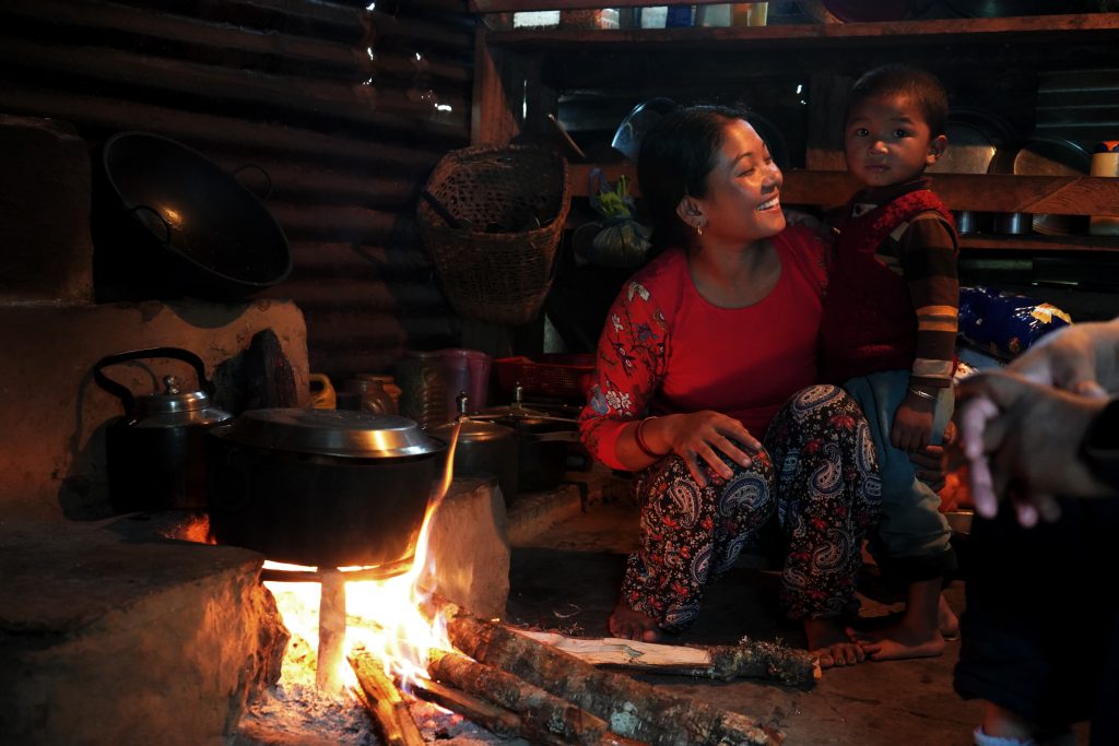 Nepali mother and son in their home.