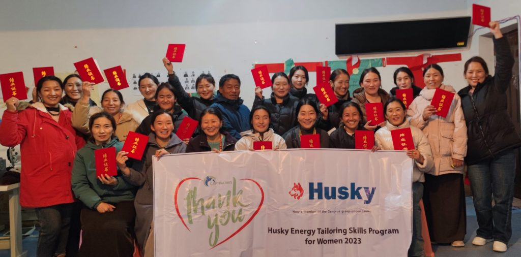 Husky Participants Taking a Group Photo