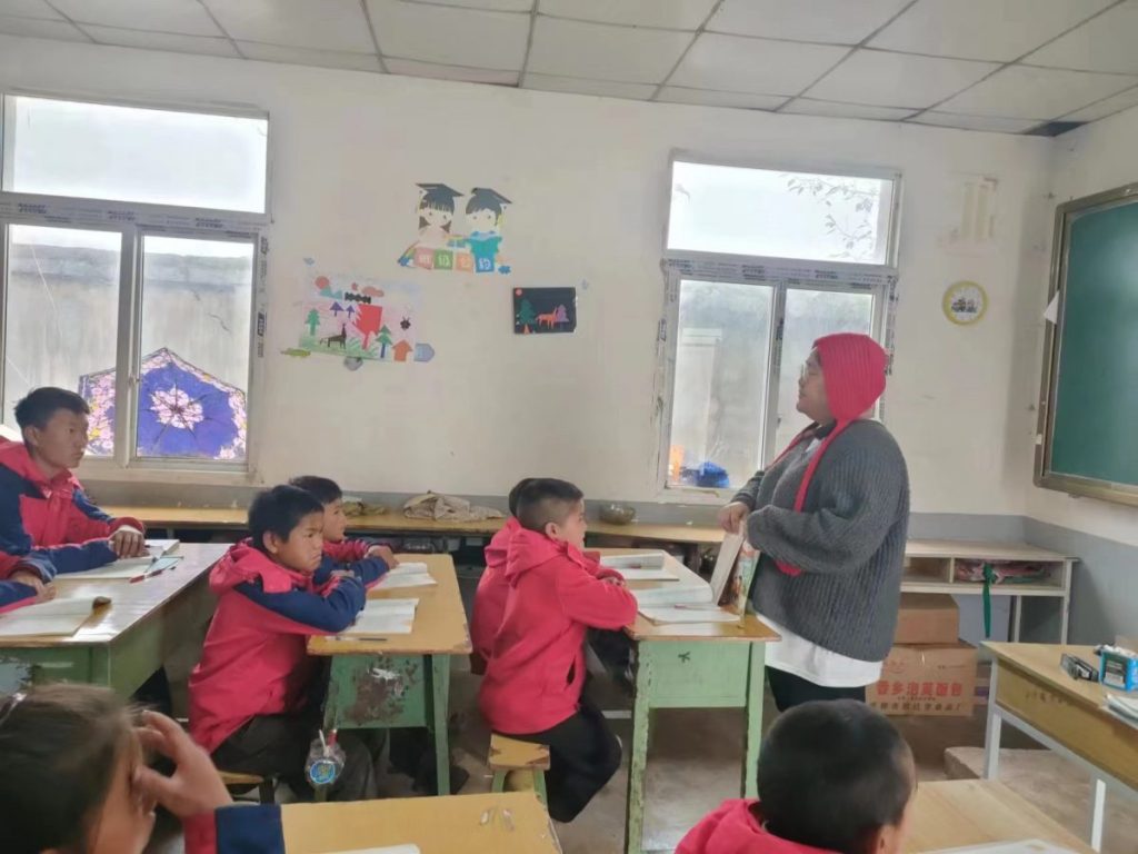 Teacher with students in a classroom